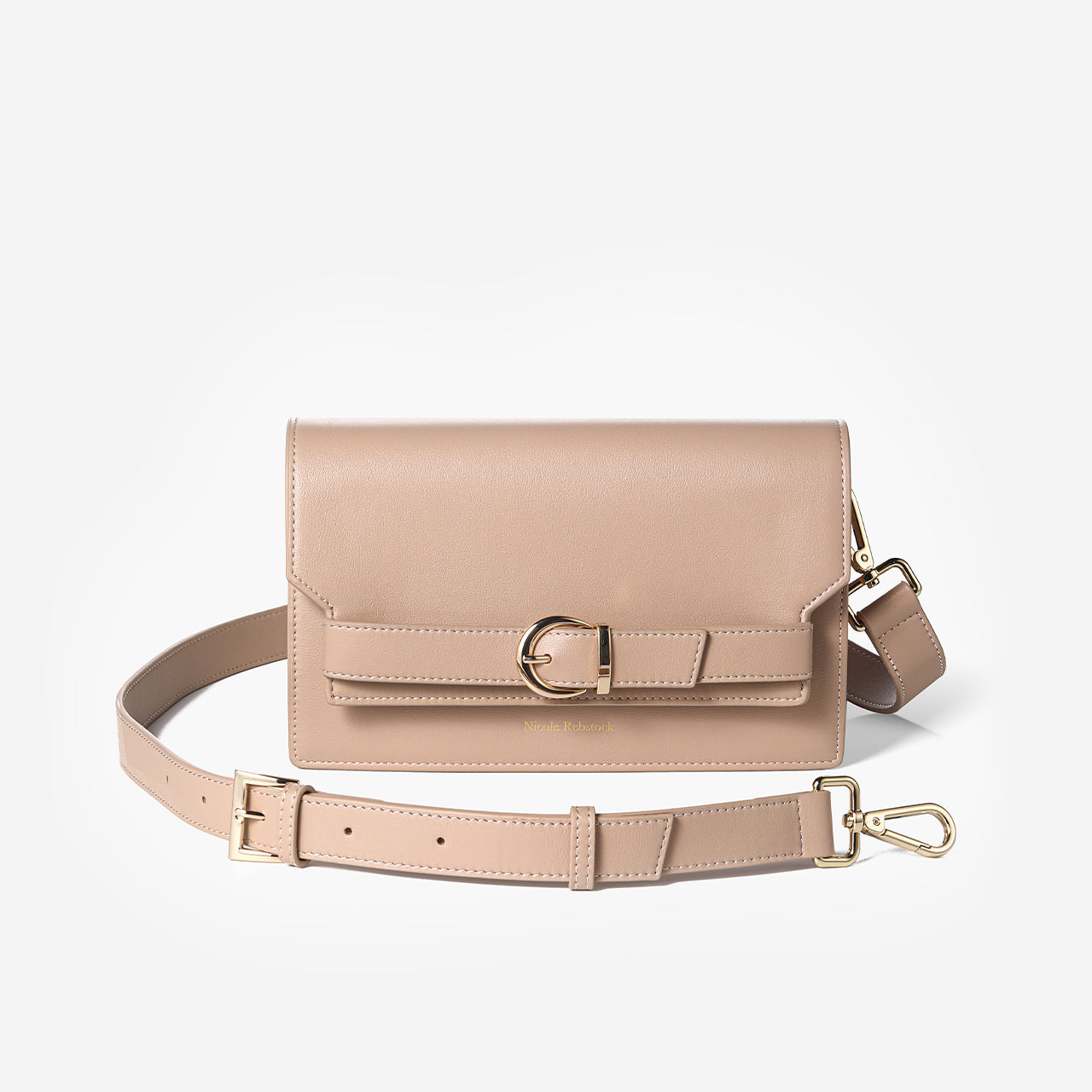 Capri Nude colour crossbody bag. medium size with gold buckle and leather strap.